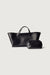 Structured leather handbag in black — main image