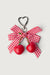 Cherry ribbon bag charm in red — main image