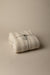 Linea wool blend throw in birch humus — main image