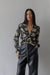 Collared floral blouse in black print — main image