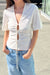 Front cutout top in coconut milk — main image