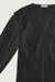 Ruffled v-neck blouse in black — main image