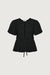 Puff sleeve front tie blouse in black — main image