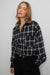Oversized flannel plaid shirt in black plaid — main image