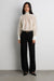 Blouse with tie neck detail in cream — main image