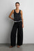 Sheer peplum top in black — main image