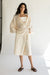 Loose button up shirt in beige tofu — main image