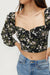 Floral puff sleeve top in black floral — main image