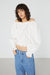 Off shoulder ruffled top in white — main image