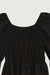 Off shoulder ruched top in black — main image
