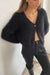 Fuzzy cardigan in black — main image