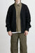 Rib-knit cardigan in black — main image