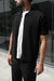 Short sleeve button up sweater in black — main image