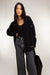 Contrast stitch detail button front cardigan in black cream — main image