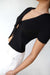 Cropped short sleeve sweater with open front ties in black — main image