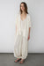 Draped open front ribbed cardigan in beige — main image