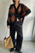 Oversized argyle cardigan in black argyle — main image