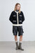 Fuzzy colour block cardigan in black cream — main image