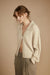 Cable knit button up cardigan in oatmeal — main image