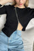 Asymmetrical zip front top in black — main image