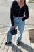 Cropped button front cardigan in black — main image