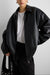 Vegan leather bomber jacket in black — main image