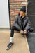 Quilted puffer shacket in black — main image