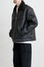 Vegan leather sherpa jacket in black — main image