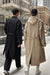 Water repellent cotton trench coat in black — main image
