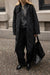 Quilted puffer midi shacket in black — main image