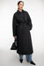 Oversized puffer trench coat in black — main image