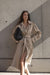 Oversized trench coat with funnel neck in beige — main image