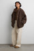 Oversized boucle jacket with snap detail in brown — main image