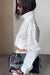 Polka dot funnel neck jacket in white — main image