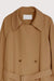 Oversized trench coat in warm beige — main image