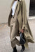 Oversized trench coat in dusky green — main image