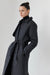 Long belted puffer coat in black — main image
