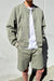 Varsity jacket in shadow — main image