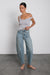 Mid-rise darted barrel leg jean in green cast medium wash — main image