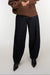 Dark wash barrel jeans in blue — main image