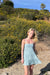 Floral tiered mini dress in stone blue floral — main image