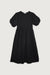 Textured puff sleeve dress in black — main image