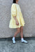 Cotton poplin tiered mini dress in mellow yellow — main image