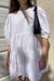Cotton poplin tiered mini dress in white — main image