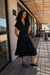 Tiered midi dress with cutouts in black — main image