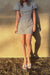 Gingham mini dress with side cutouts in cream navy — main image