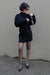 Mini turtleneck sweater dress in black — main image