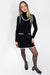Contrast trim sleeveless knit mini dress in black cream — main image