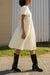 Textured puff sleeve midi dress in cream — main image