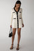 Contrast trim button front knit mini dress in cream black — main image